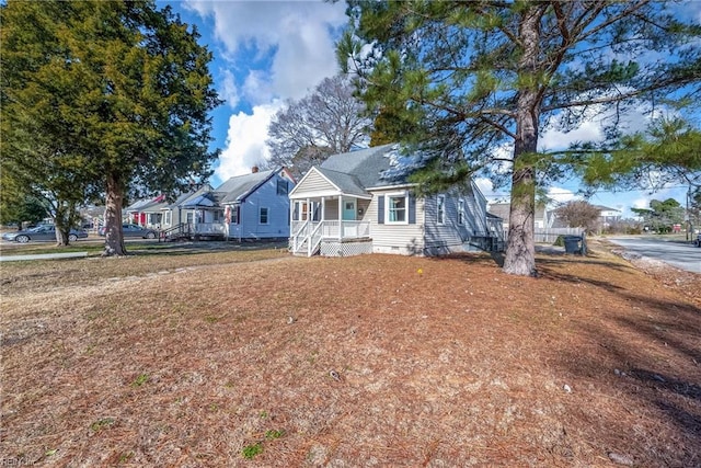 view of front of property featuring covered porch