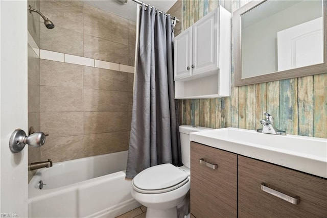 full bathroom featuring vanity, shower / bathtub combination with curtain, and toilet