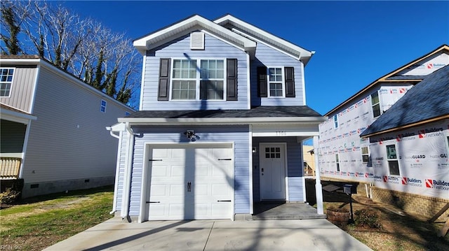 view of front property with a garage