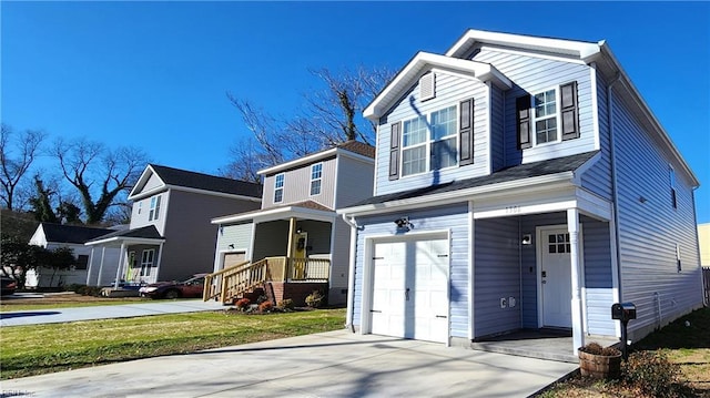 view of front of property with a garage and a front lawn