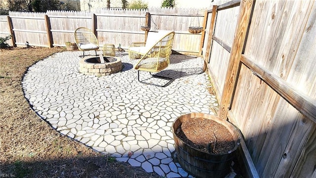 exterior space featuring an outdoor fire pit