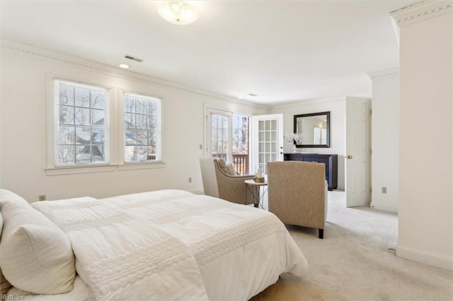 carpeted bedroom featuring multiple windows and crown molding