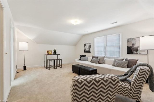 carpeted living room with lofted ceiling