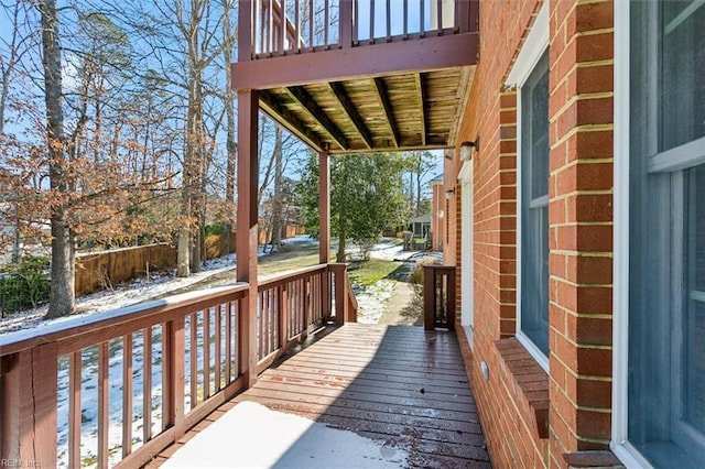 view of snow covered deck