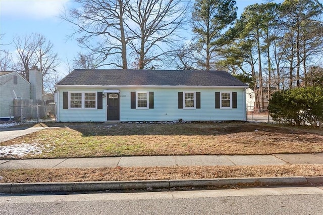 view of front of property with a front lawn