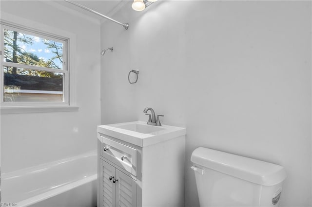 full bathroom featuring bathing tub / shower combination, vanity, and toilet