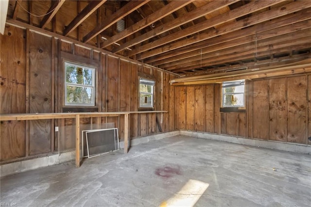 miscellaneous room with plenty of natural light and concrete flooring