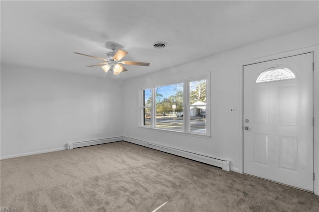 carpeted entrance foyer with ceiling fan