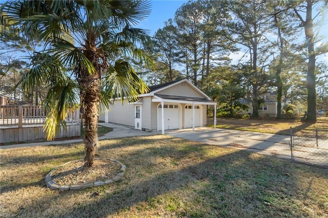 view of home's exterior featuring a garage and a yard