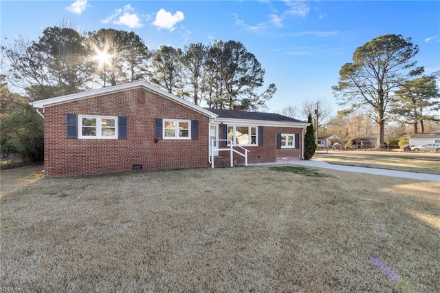 ranch-style house with a front yard