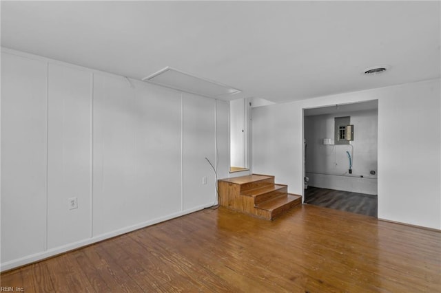 empty room featuring wood-type flooring