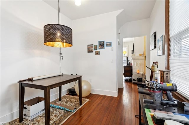 corridor featuring dark hardwood / wood-style flooring