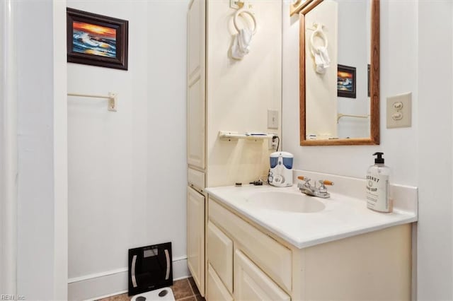 bathroom featuring tile patterned floors and vanity