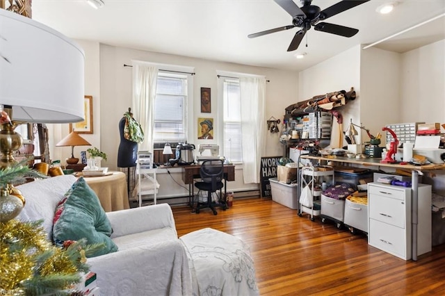 office area featuring ceiling fan and dark hardwood / wood-style flooring