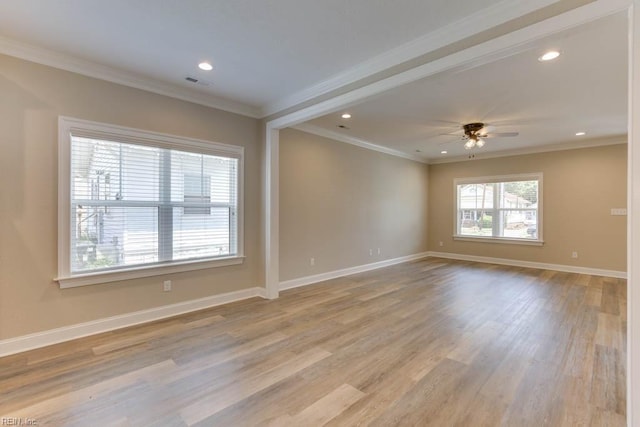 empty room featuring light wood-type flooring, ceiling fan, and ornamental molding