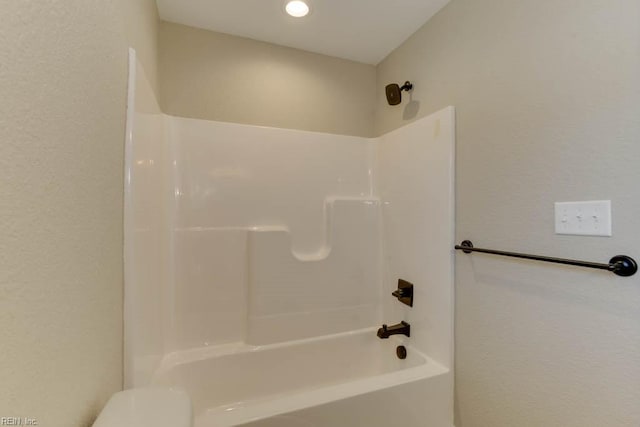 bathroom with shower / bath combination