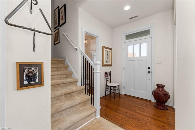 foyer entrance featuring hardwood / wood-style flooring