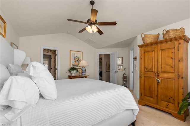 bedroom featuring ceiling fan, light carpet, and vaulted ceiling