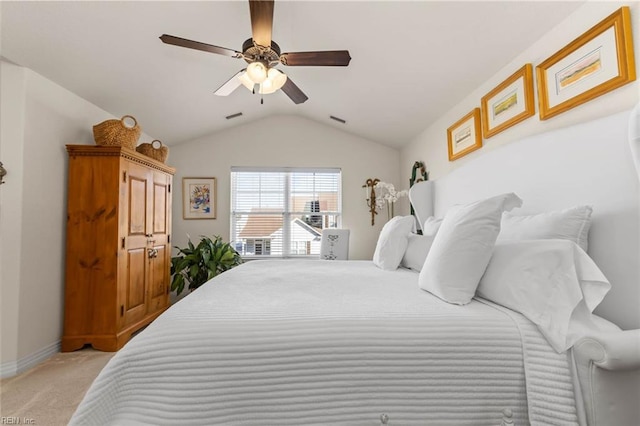 bedroom featuring ceiling fan, light carpet, and lofted ceiling