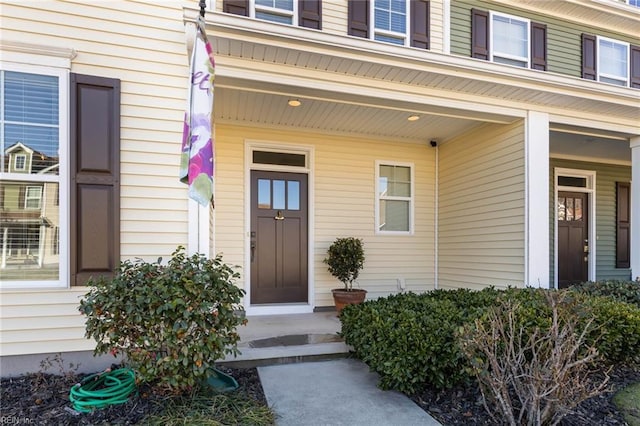 doorway to property featuring a porch