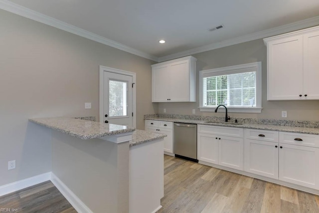 kitchen featuring white cabinetry, dishwasher, sink, kitchen peninsula, and light hardwood / wood-style floors