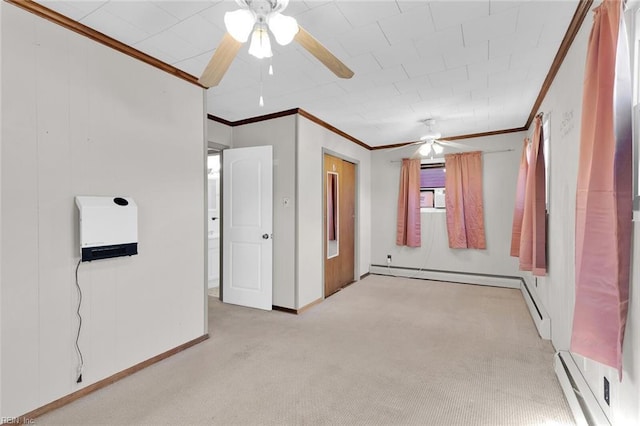 unfurnished room with light carpet, baseboard heating, crown molding, and ceiling fan