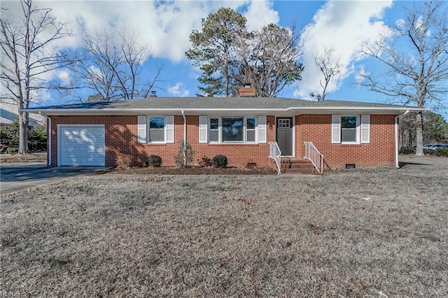 single story home featuring a garage