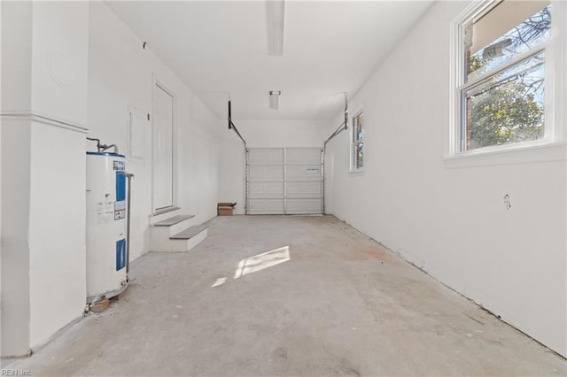 garage featuring water heater