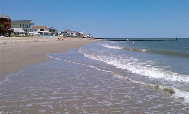 property view of water featuring a beach view