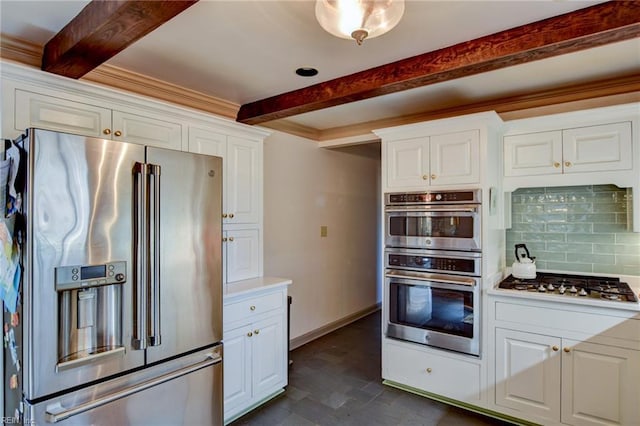 kitchen with white cabinets, beam ceiling, stainless steel appliances, and decorative backsplash