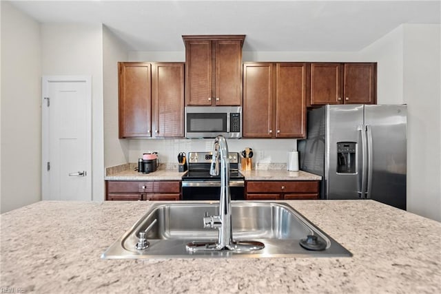 kitchen with stainless steel appliances and sink