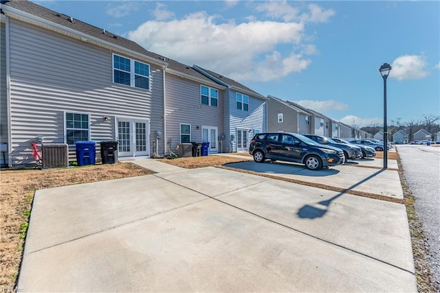 exterior space featuring french doors and central AC unit