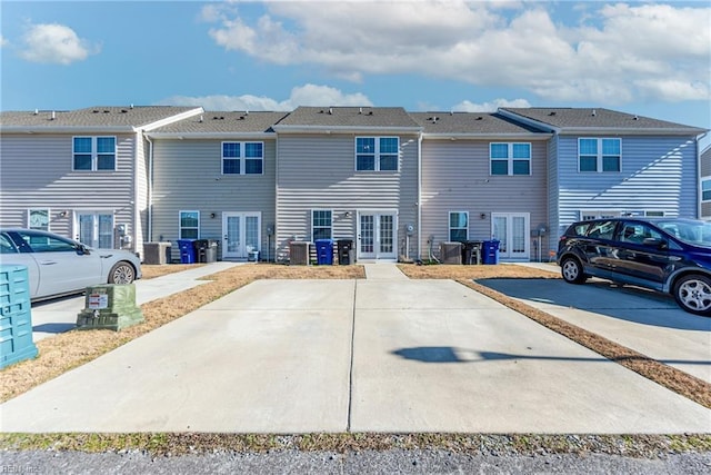 rear view of property featuring french doors