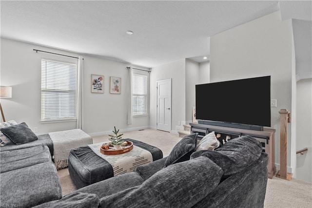 living room with light colored carpet