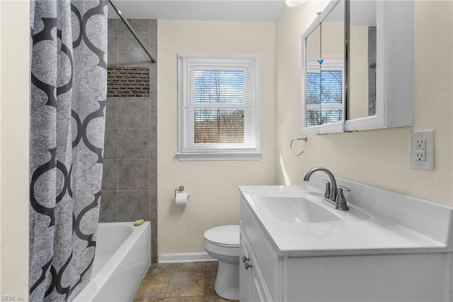 full bathroom with vanity, shower / bath combination with curtain, and toilet