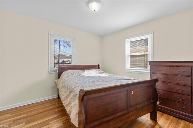 bedroom with light hardwood / wood-style flooring