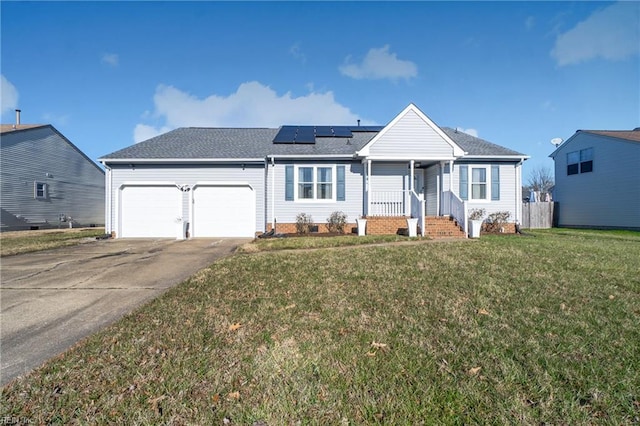 single story home with a porch, a garage, a front yard, and solar panels