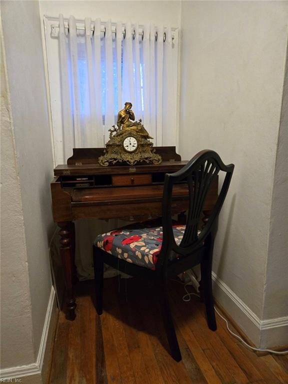 sitting room with dark hardwood / wood-style floors