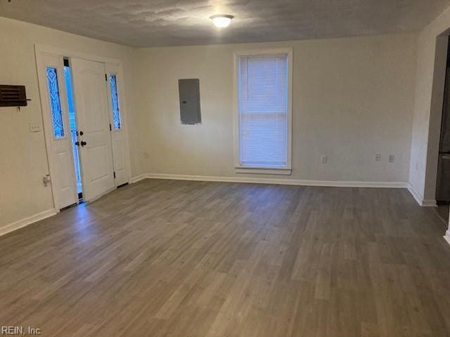 entrance foyer with electric panel and dark hardwood / wood-style flooring