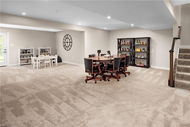 view of carpeted dining area