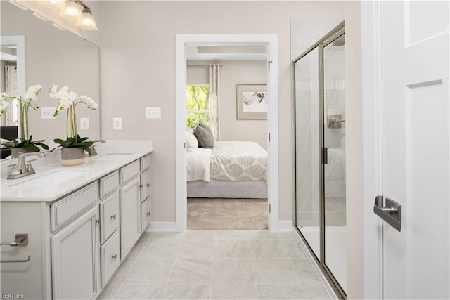 bathroom with vanity and walk in shower