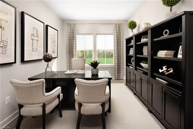 home office featuring light hardwood / wood-style floors