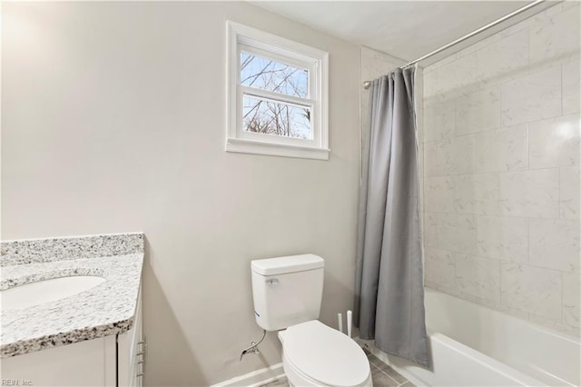 full bathroom with vanity, toilet, and shower / bath combo with shower curtain