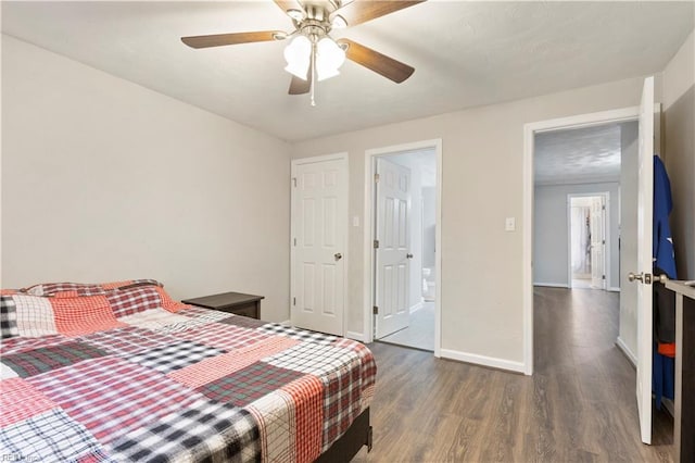 bedroom featuring ceiling fan and dark hardwood / wood-style flooring