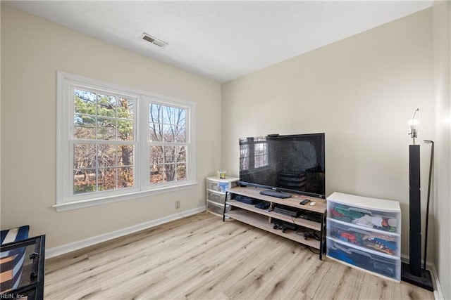 living room featuring light wood-type flooring