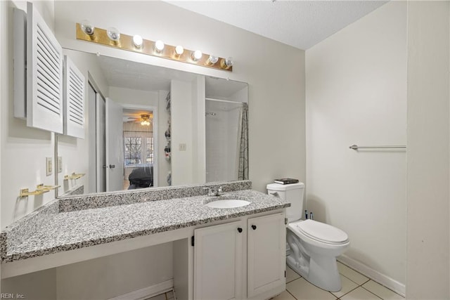 bathroom featuring tile patterned floors, walk in shower, a textured ceiling, vanity, and toilet