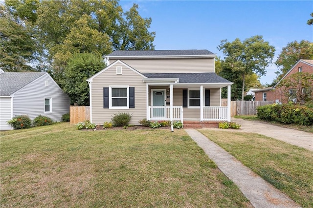 bungalow-style house featuring a front lawn and a porch