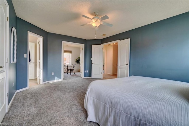 bedroom with ceiling fan and light carpet