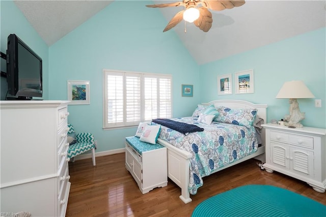 bedroom featuring ceiling fan, dark hardwood / wood-style flooring, and high vaulted ceiling