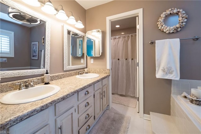 bathroom featuring tile patterned flooring and vanity